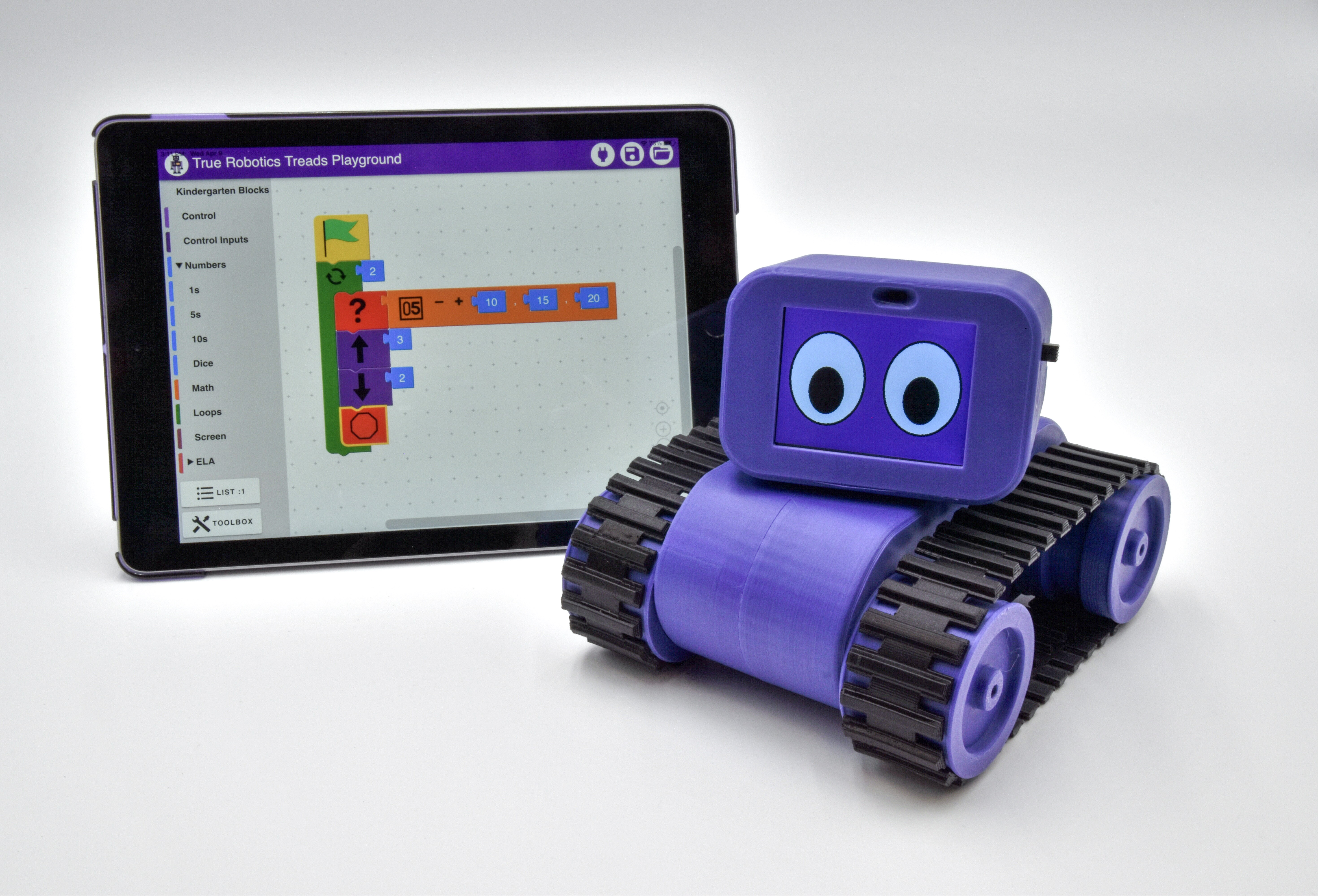 Students coding with Treads robot